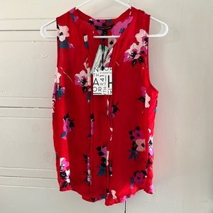 Red floral blouse